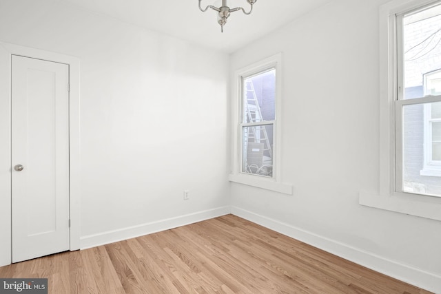 empty room with light wood-type flooring