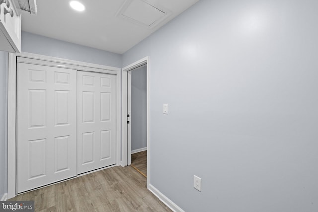 hallway featuring light hardwood / wood-style floors