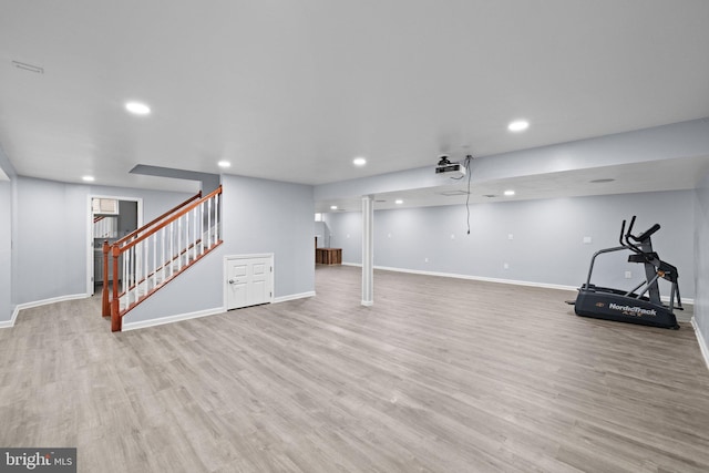 basement featuring light hardwood / wood-style floors