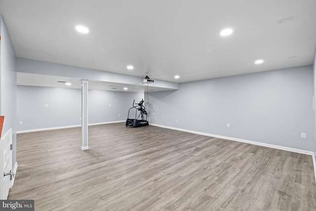 basement featuring light wood-type flooring