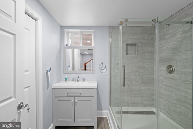 bathroom featuring vanity and walk in shower