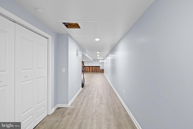 hallway featuring light hardwood / wood-style flooring