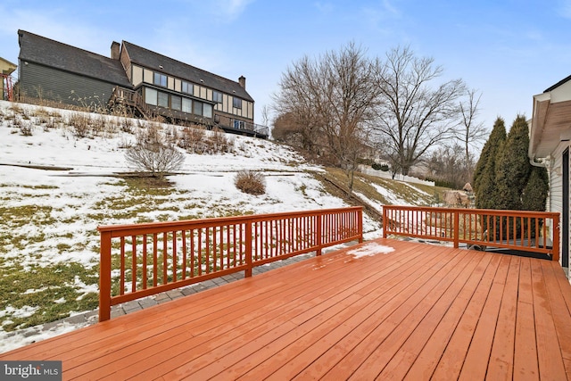 view of snow covered deck