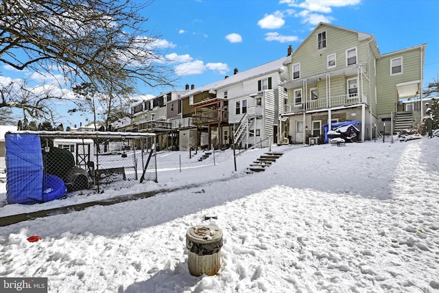 view of snow covered property