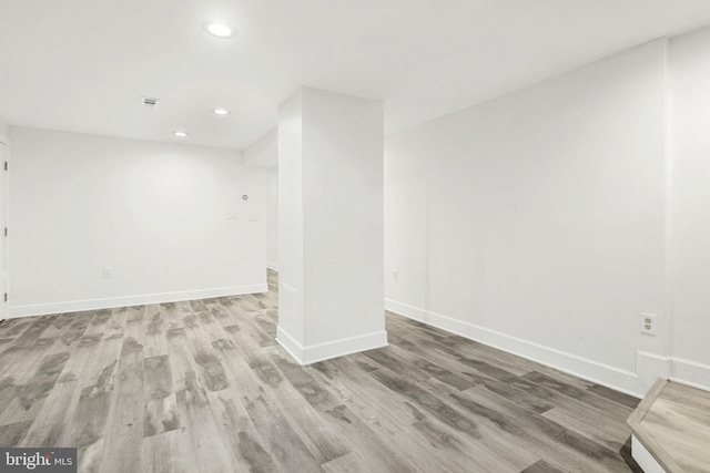 interior space with hardwood / wood-style floors