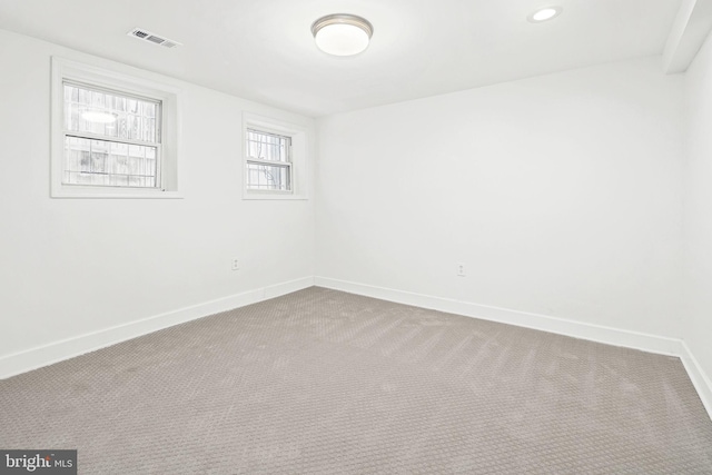 unfurnished room featuring carpet floors