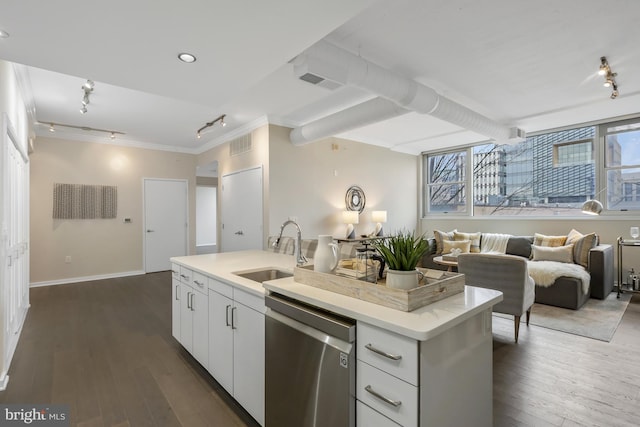 kitchen featuring sink, dishwasher, a kitchen island with sink, white cabinets, and dark hardwood / wood-style flooring