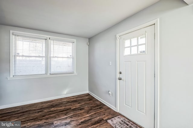 entryway with dark hardwood / wood-style floors