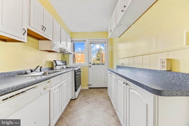 kitchen featuring sink, white appliances, and white cabinets