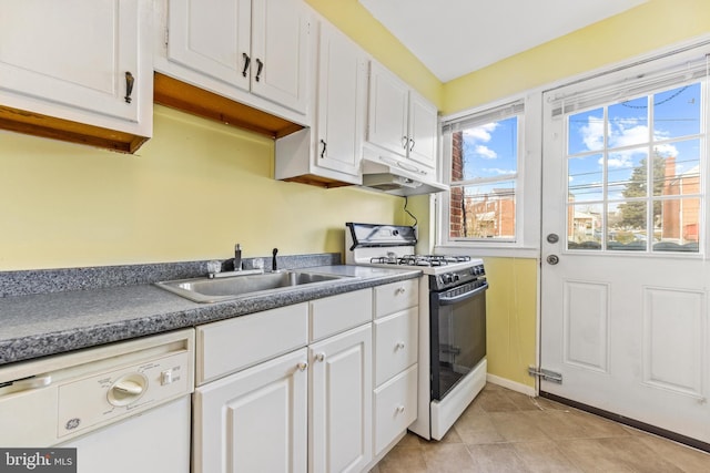 kitchen featuring white dishwasher, sink, white cabinetry, and range with gas cooktop