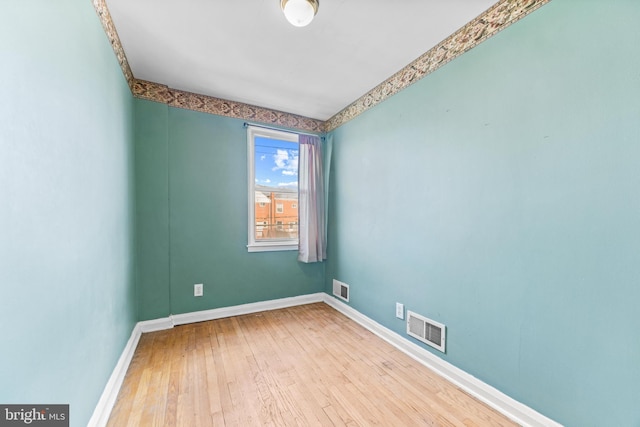 empty room featuring light hardwood / wood-style flooring