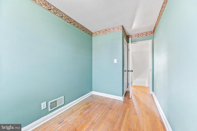 empty room with light wood-type flooring