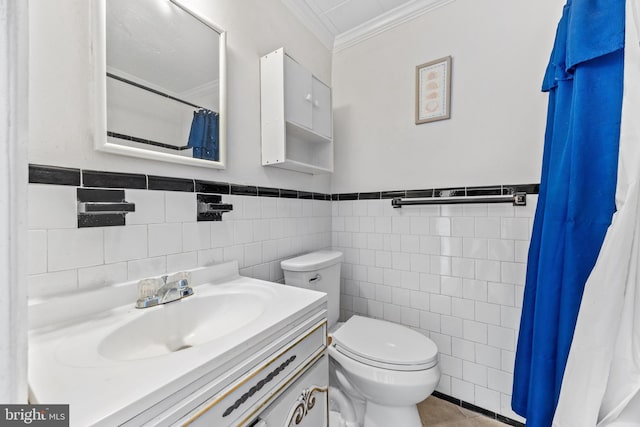 bathroom featuring tile patterned flooring, vanity, crown molding, and toilet