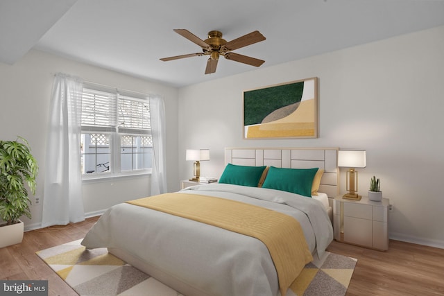 bedroom featuring ceiling fan and light wood-type flooring