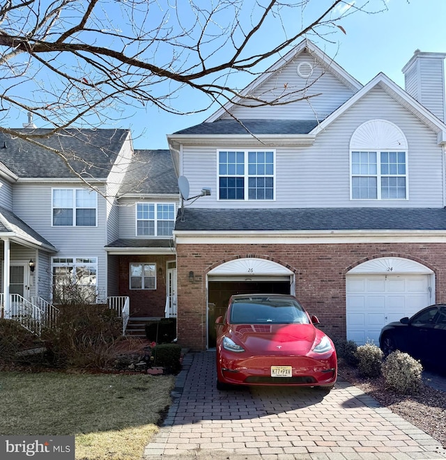 view of front of property featuring a garage