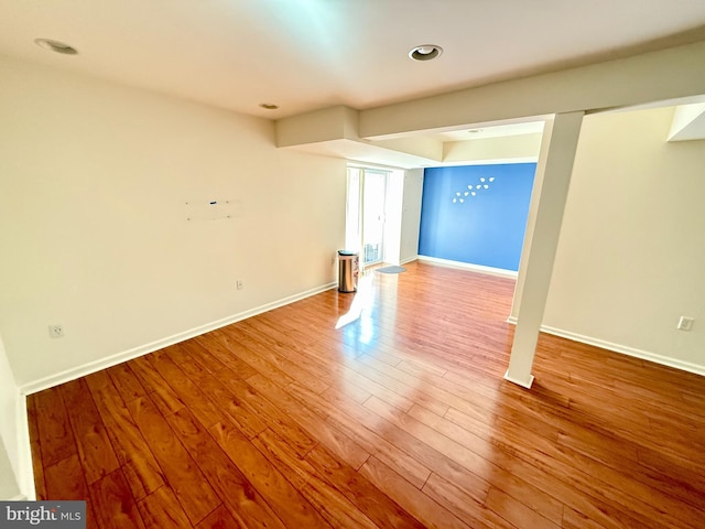 unfurnished room featuring hardwood / wood-style floors