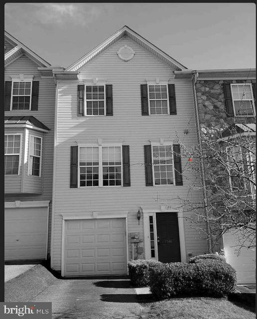 view of property featuring a garage