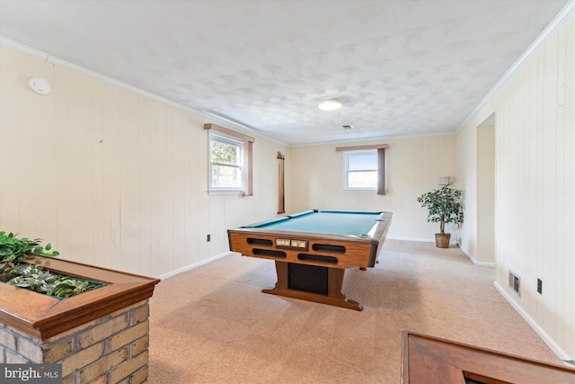 playroom with light carpet, pool table, ornamental molding, and baseboards