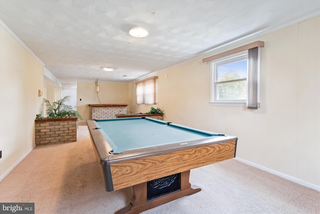 recreation room with pool table, light carpet, crown molding, and baseboards