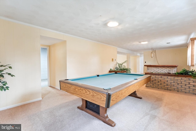 recreation room with ornamental molding, light carpet, billiards, and baseboards