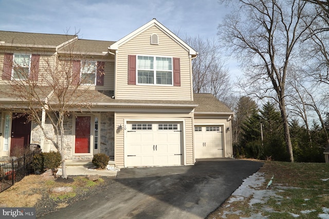 view of front of home with a garage