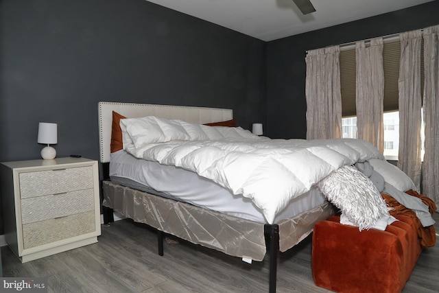 bedroom featuring dark hardwood / wood-style flooring