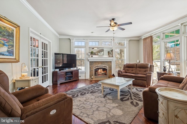 living room featuring ornamental molding, dark hardwood / wood-style floors, and ceiling fan