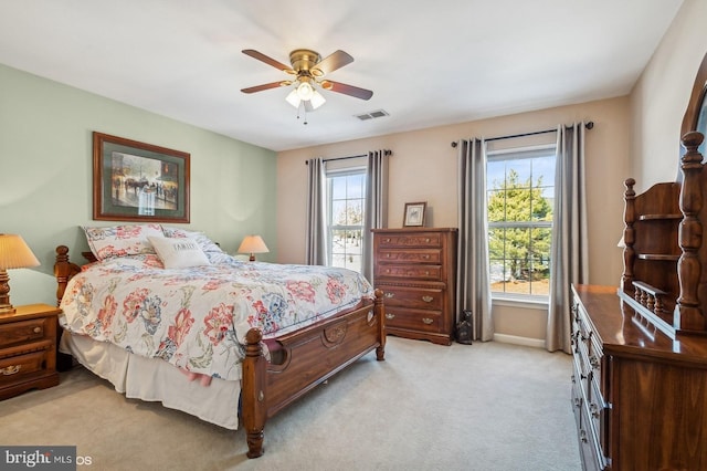 carpeted bedroom with ceiling fan