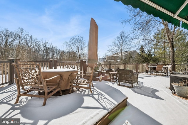 view of snow covered patio