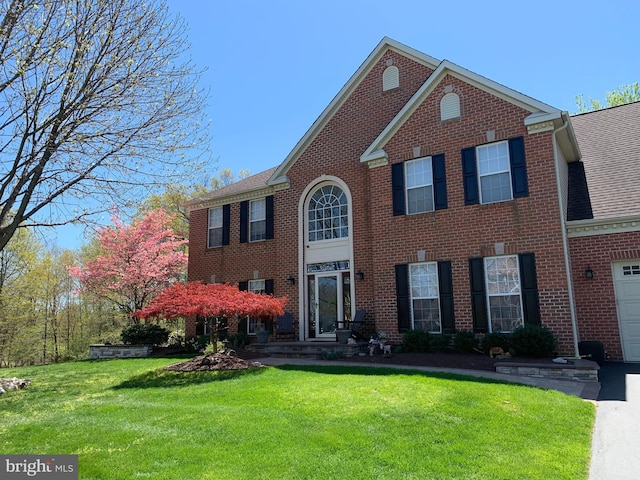 view of front facade with a front lawn