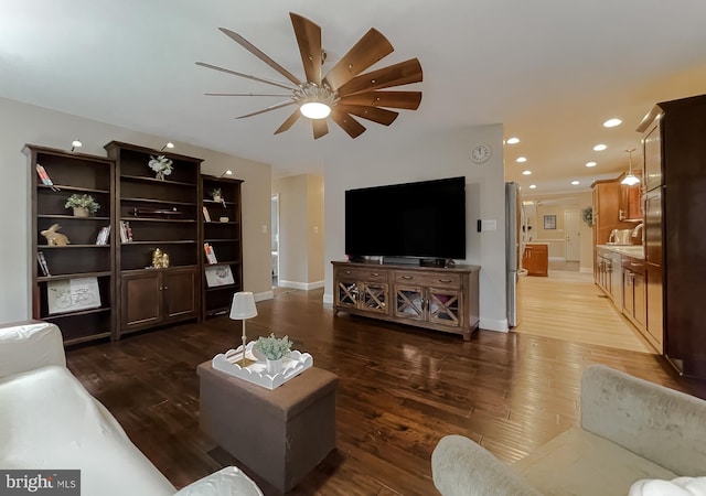 living room featuring dark hardwood / wood-style floors