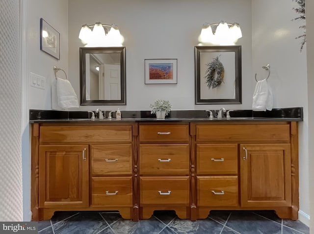 bathroom with vanity and tile patterned flooring