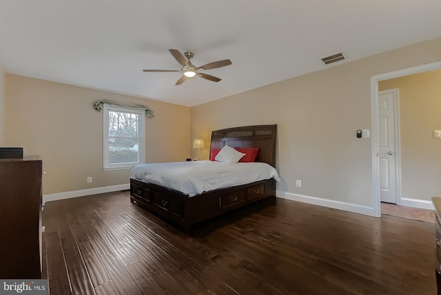 bedroom featuring dark wood-type flooring and ceiling fan