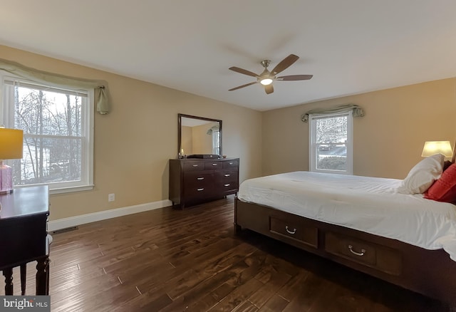 bedroom featuring ceiling fan and dark hardwood / wood-style flooring