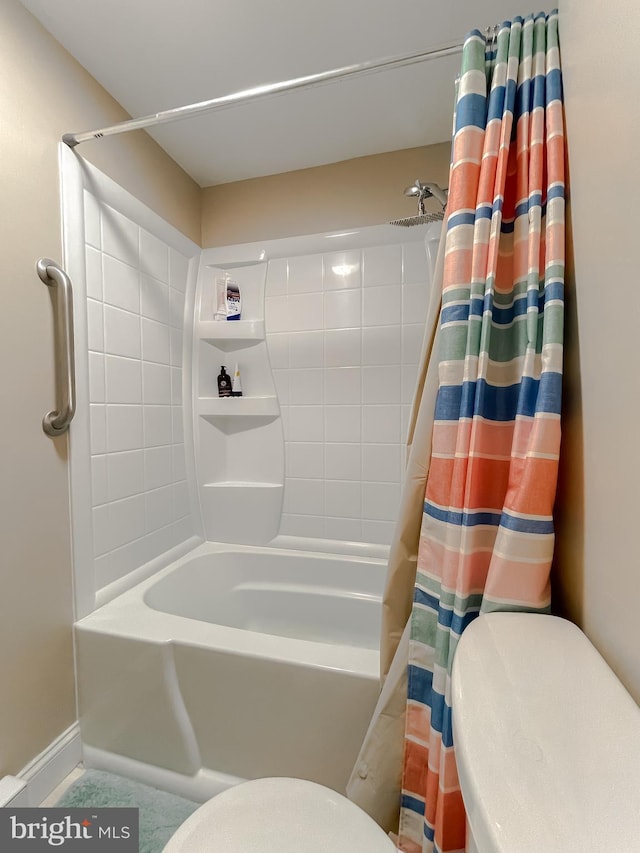 bathroom featuring shower / tub combo with curtain