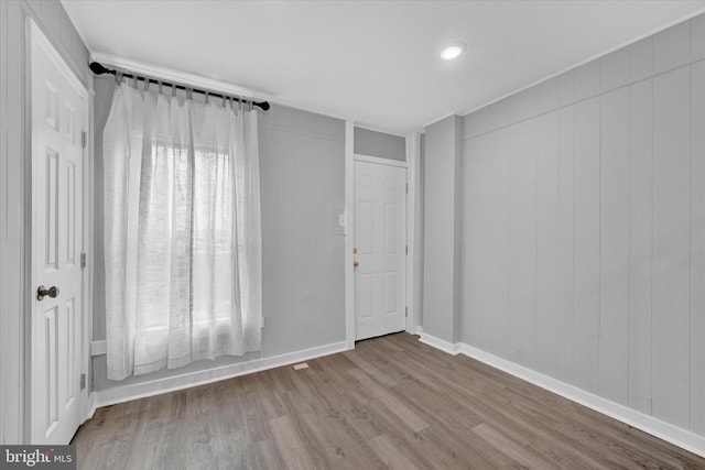 empty room featuring light hardwood / wood-style floors