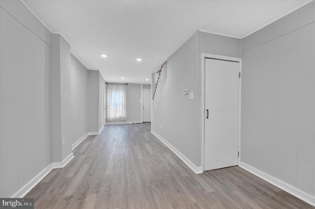 hallway with light wood-type flooring