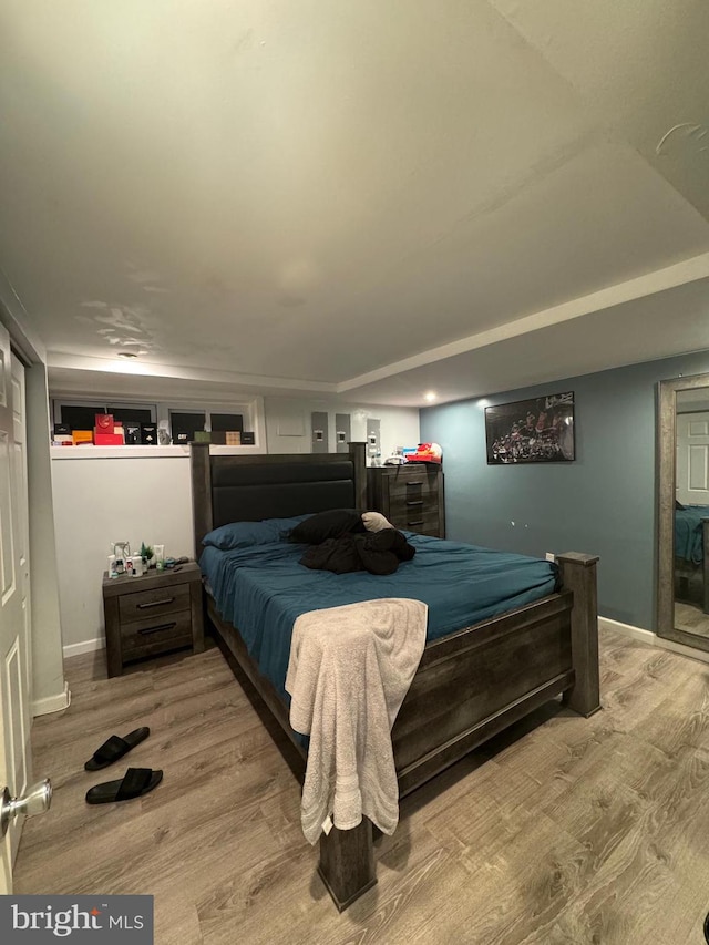 bedroom featuring hardwood / wood-style floors