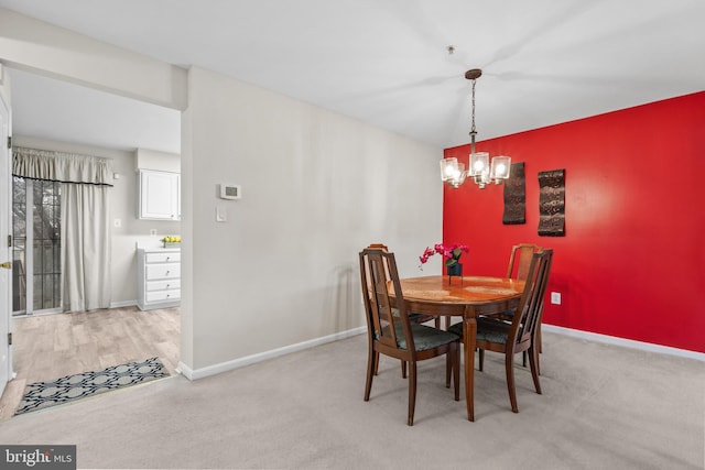 dining room featuring a chandelier