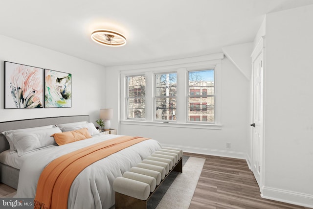 bedroom with wood-type flooring