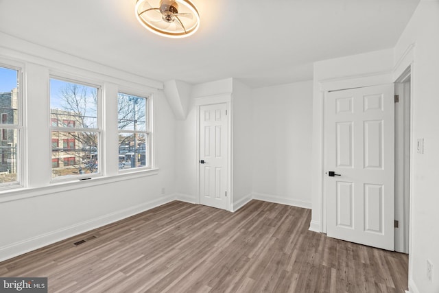 interior space with hardwood / wood-style flooring