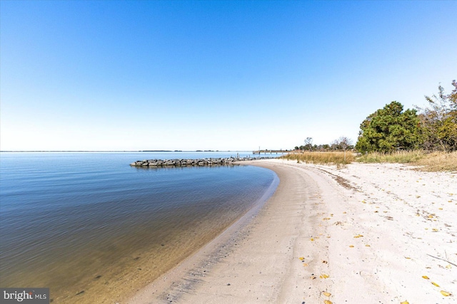 property view of water featuring a view of the beach