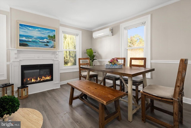 dining area featuring dark hardwood / wood-style flooring, crown molding, plenty of natural light, and a wall unit AC