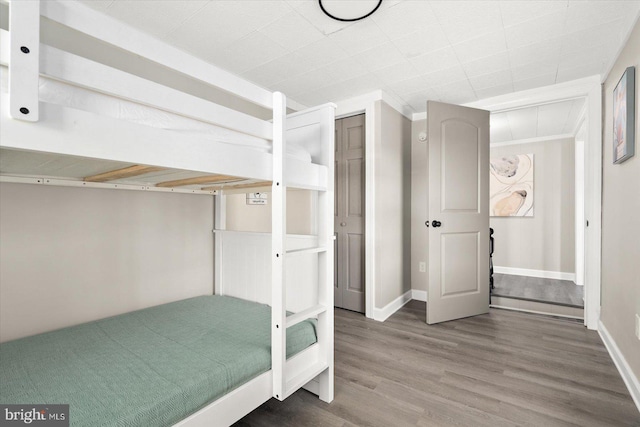 unfurnished bedroom featuring hardwood / wood-style floors