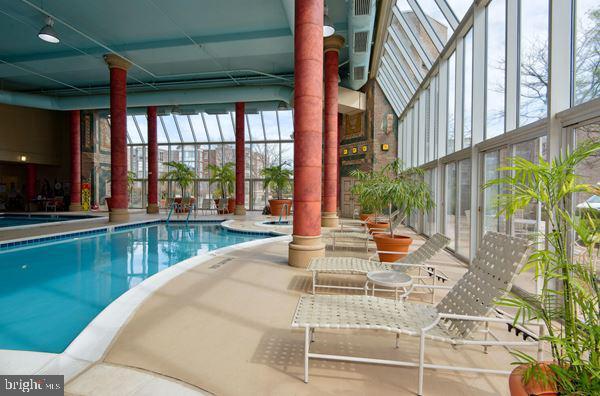 view of pool with a lanai and a patio area