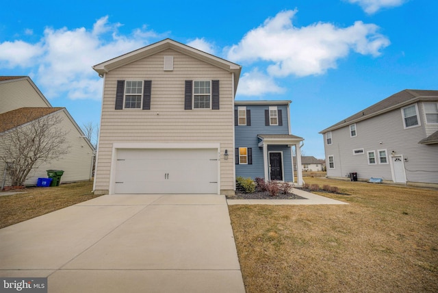 view of front of house featuring a garage and a front lawn