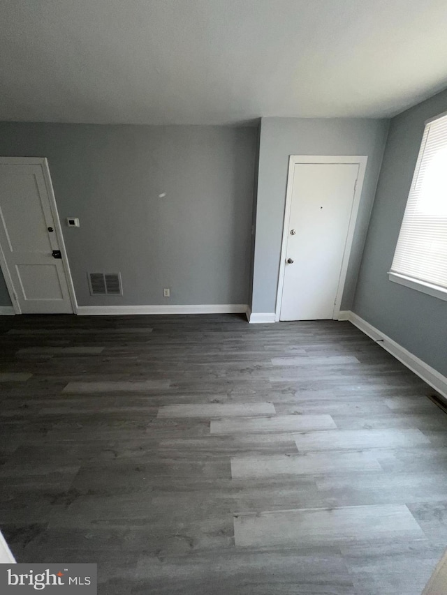 entrance foyer featuring wood-type flooring