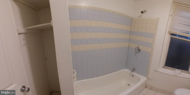 bathroom with tile patterned floors and toilet