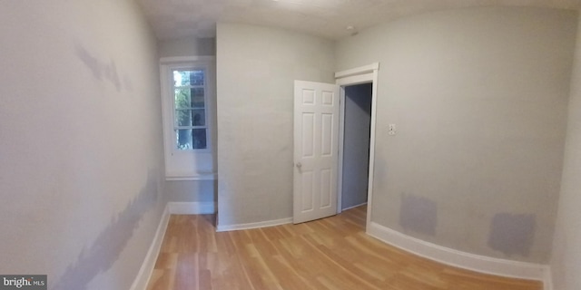 unfurnished bedroom with light hardwood / wood-style floors