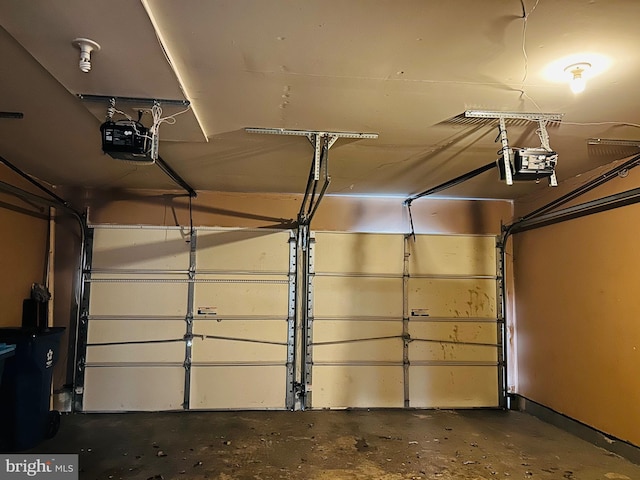 garage featuring a garage door opener